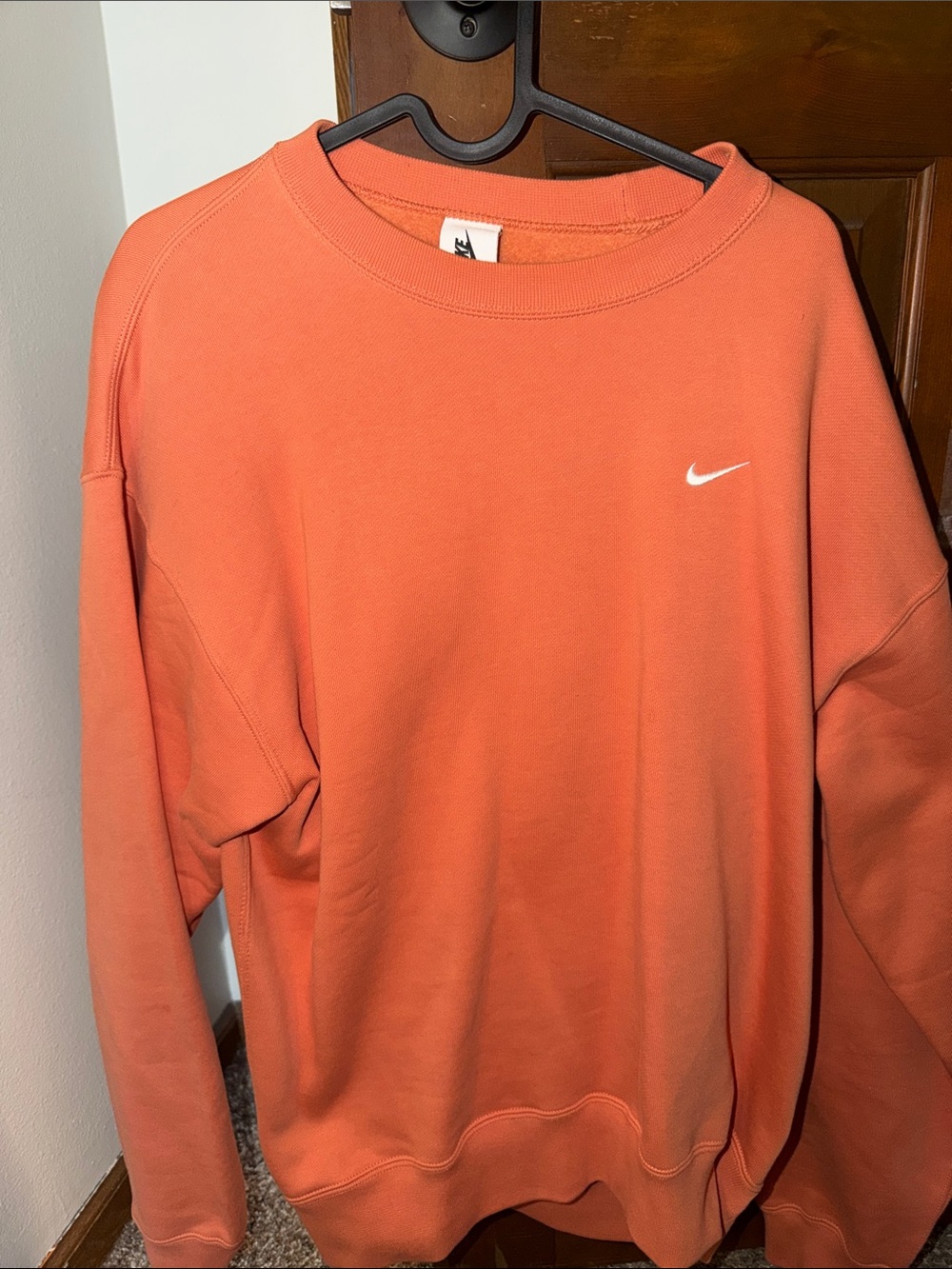 Nike Men’s Coral-Orange Crewneck Sweatshirt with White Swoosh